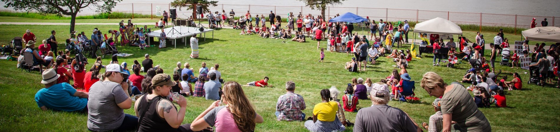 group of people gathered at the Riverbank