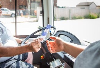 bus driver accepting a fare