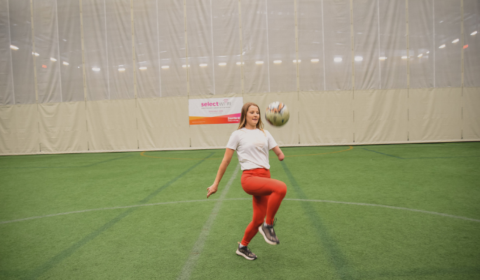 Brittany Hudak on the indoor soccer pitch at the AJFH