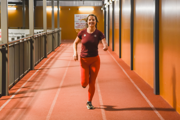 Brittany Hudak running on track