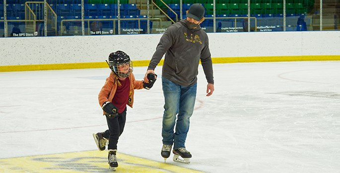Father and son skating