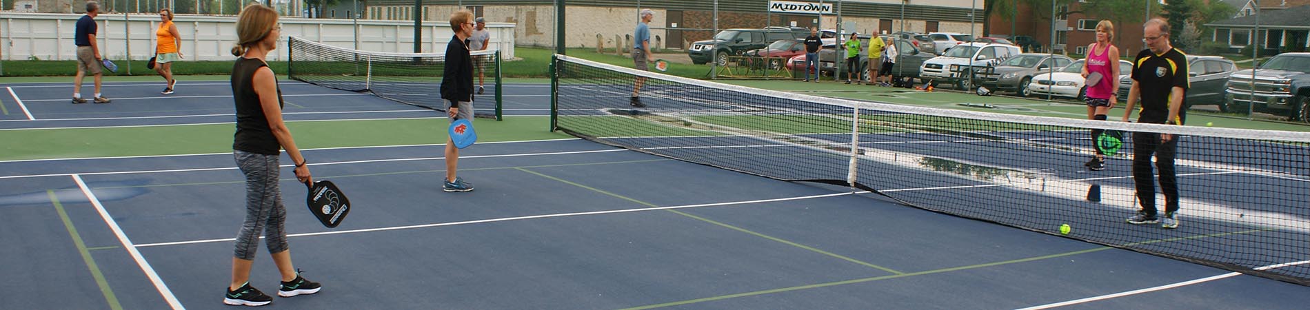 Seniors playing pickleball at Midtown