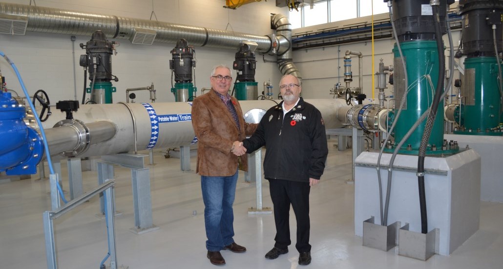 officials open the water treatment plant pump house