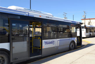 A bus with the back door open